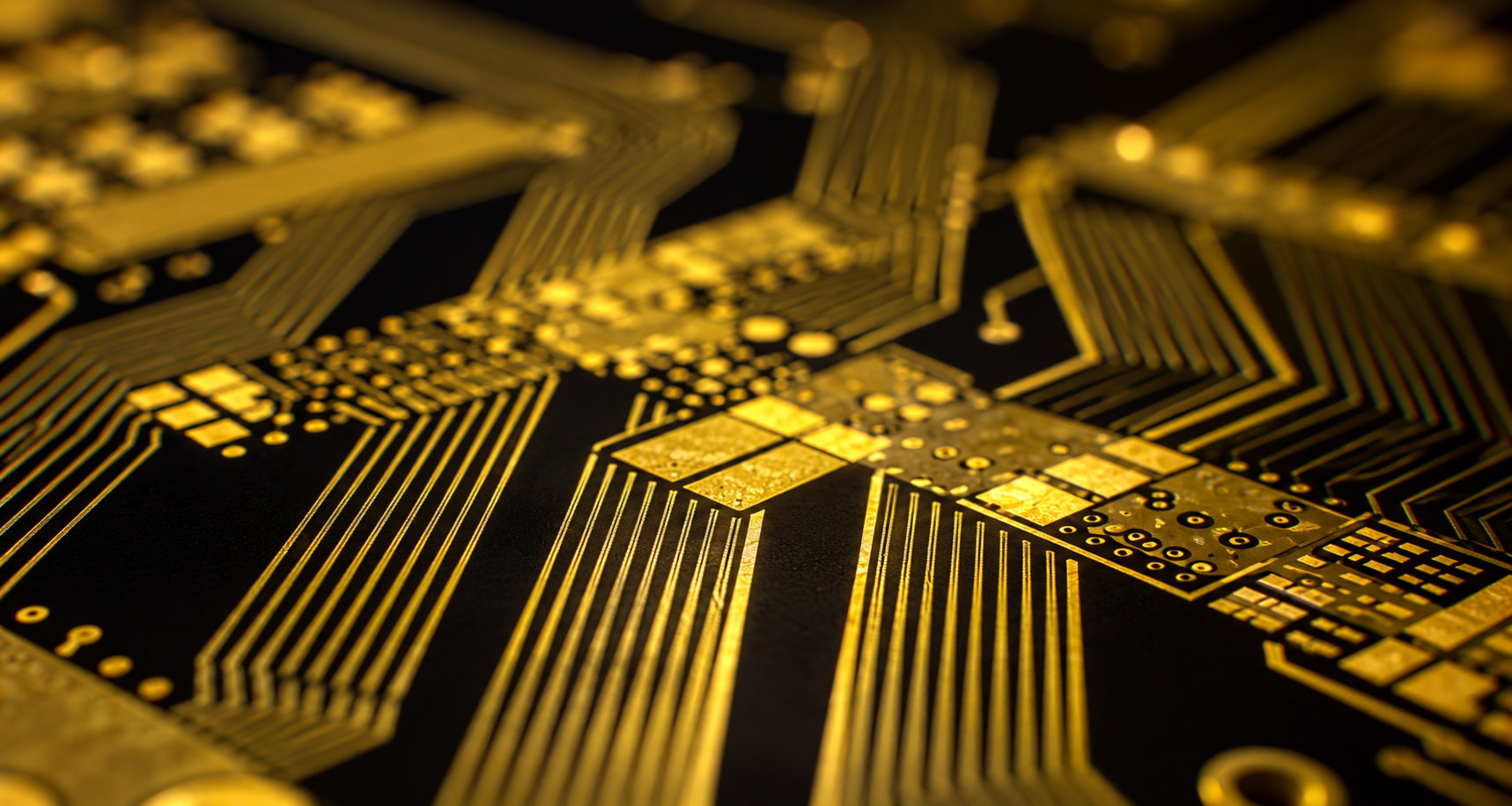 Gold circuit-board traces on a black background